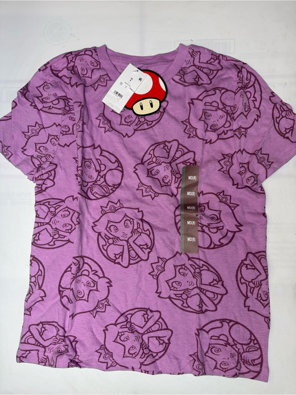 Super Mario bro. Purple tshirt with peach print